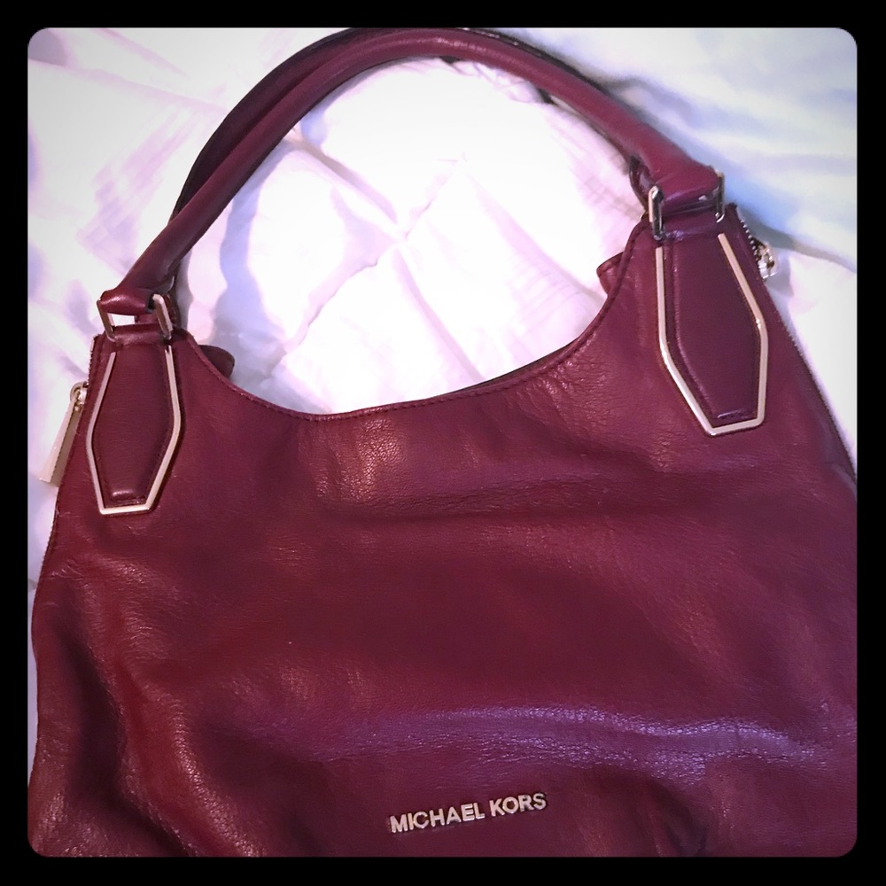 Michael Khors burgundy bag. Barely used